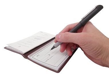 Image of a hand with a pen about to sign a cheque in a cheque book.